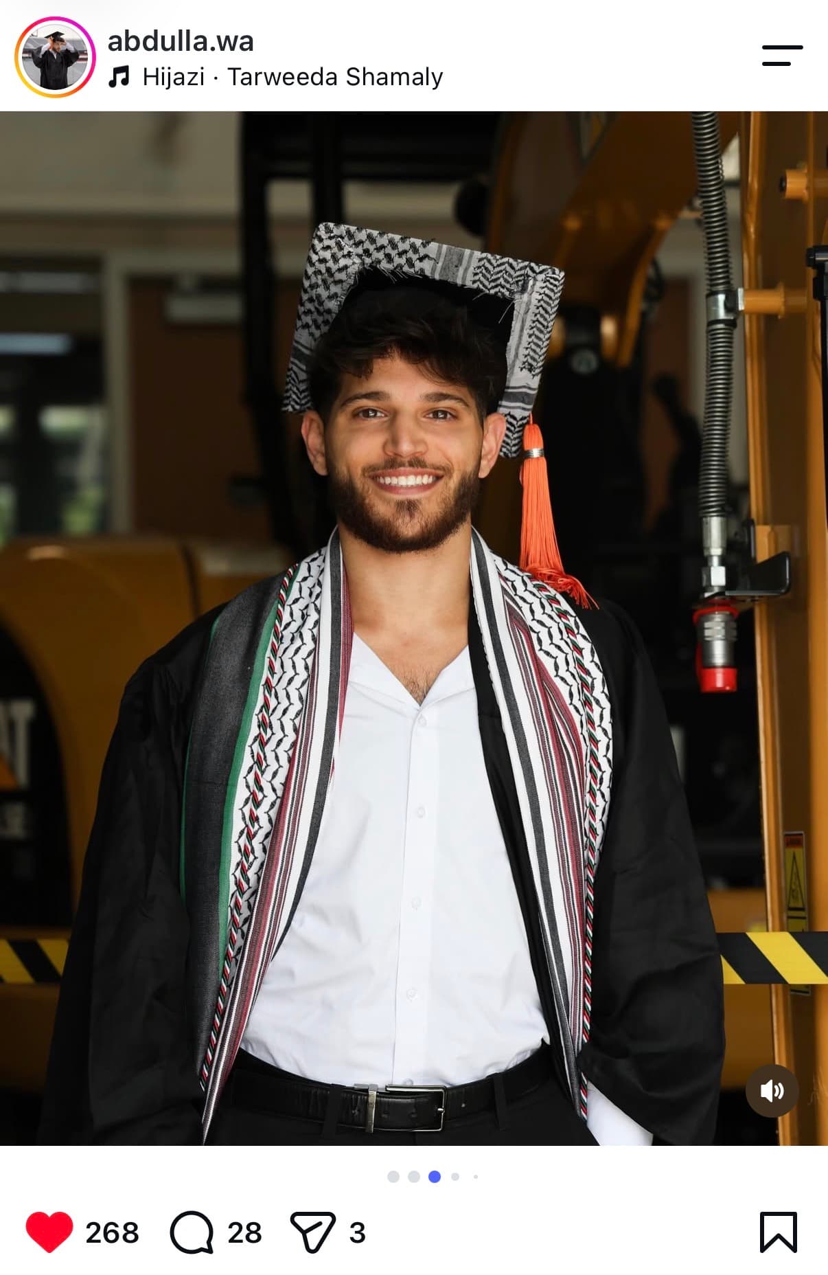 Instagram post: graduate in a keffiyeh-wrapped cap and stole, smiling in his gown