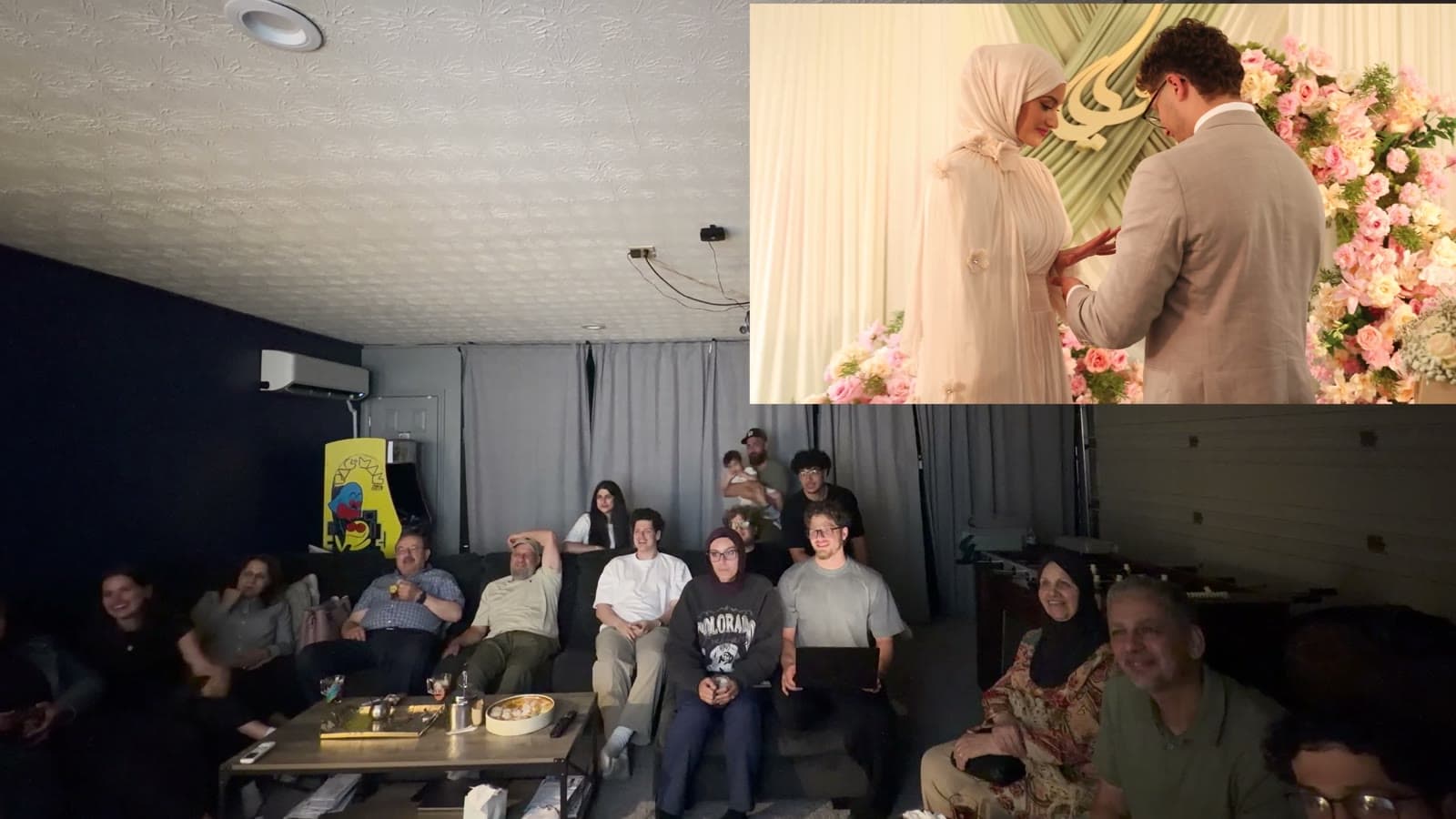 Split screen: a couple's engagement film plays above while their family watches together in a living room, smiling